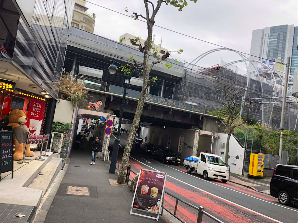 Shibuya Train tracks with small Astro Boy by Invader