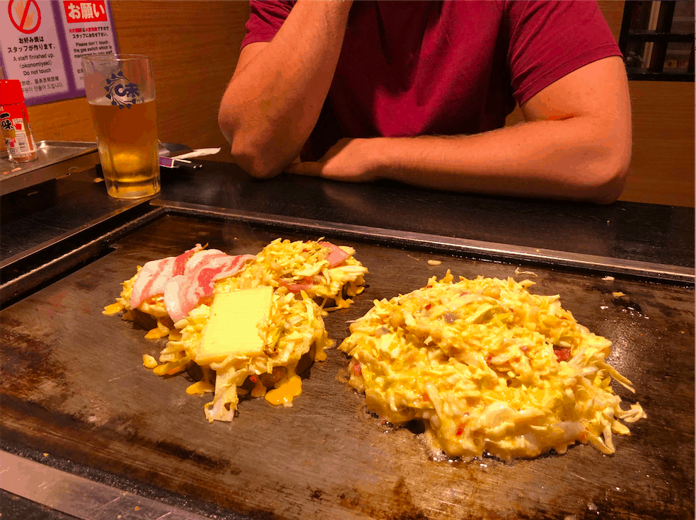 Ajinoya Okonomiyaki Okonomiyaki being cooked