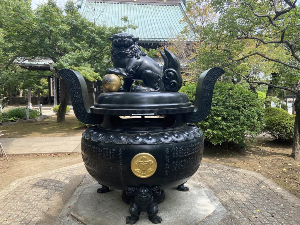 Your Ultimate Guide to Gotokuji - Cats, Cafes, and more: Lion Incense burner